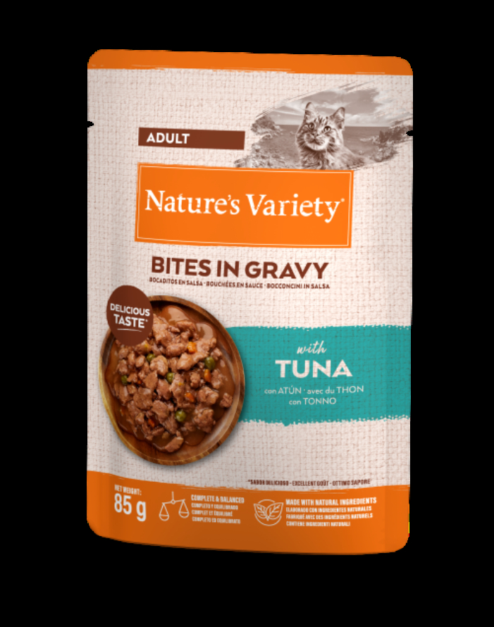 NATURE`S VARIETY Cat Bites in Gravy with Tuna 0.085 kg - pilnas vertės pašara, konservai suaugusiems katėms. Garuose virti tunų gabaliukai švelniame padaže.